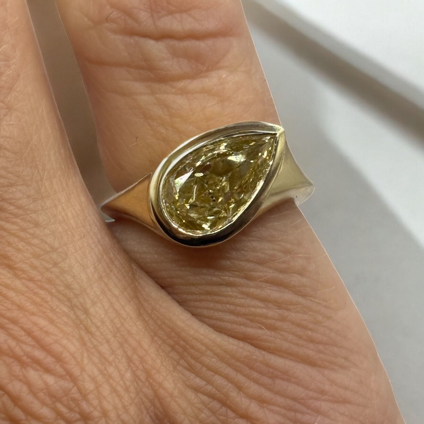 Fancy Intense Yellow Diamond Pear Tilt Ring