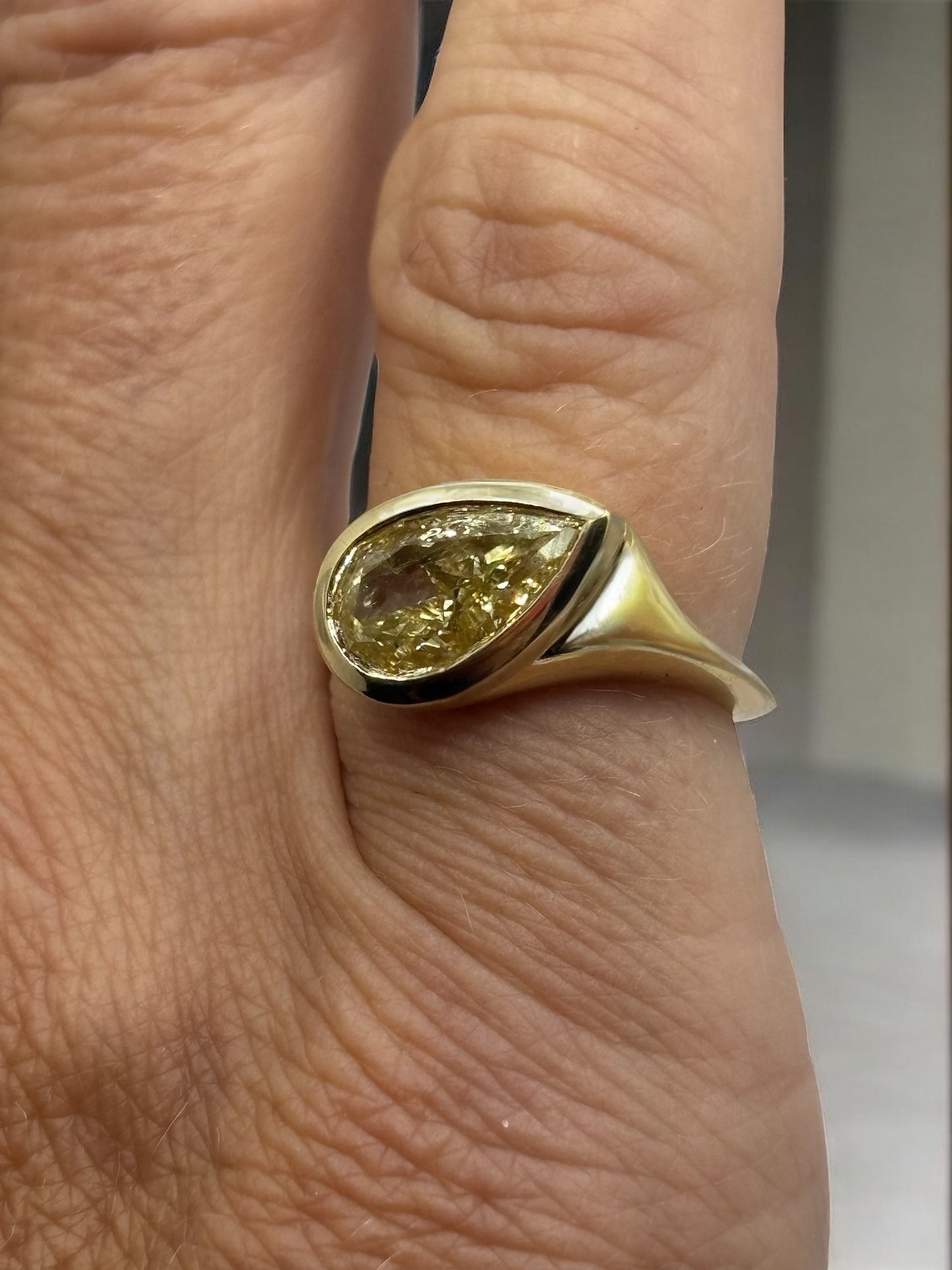 Fancy Intense Yellow Diamond Pear Tilt Ring